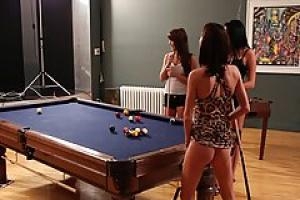 Four naked lesbians are having a great fuck on the pool table  in front of the camera